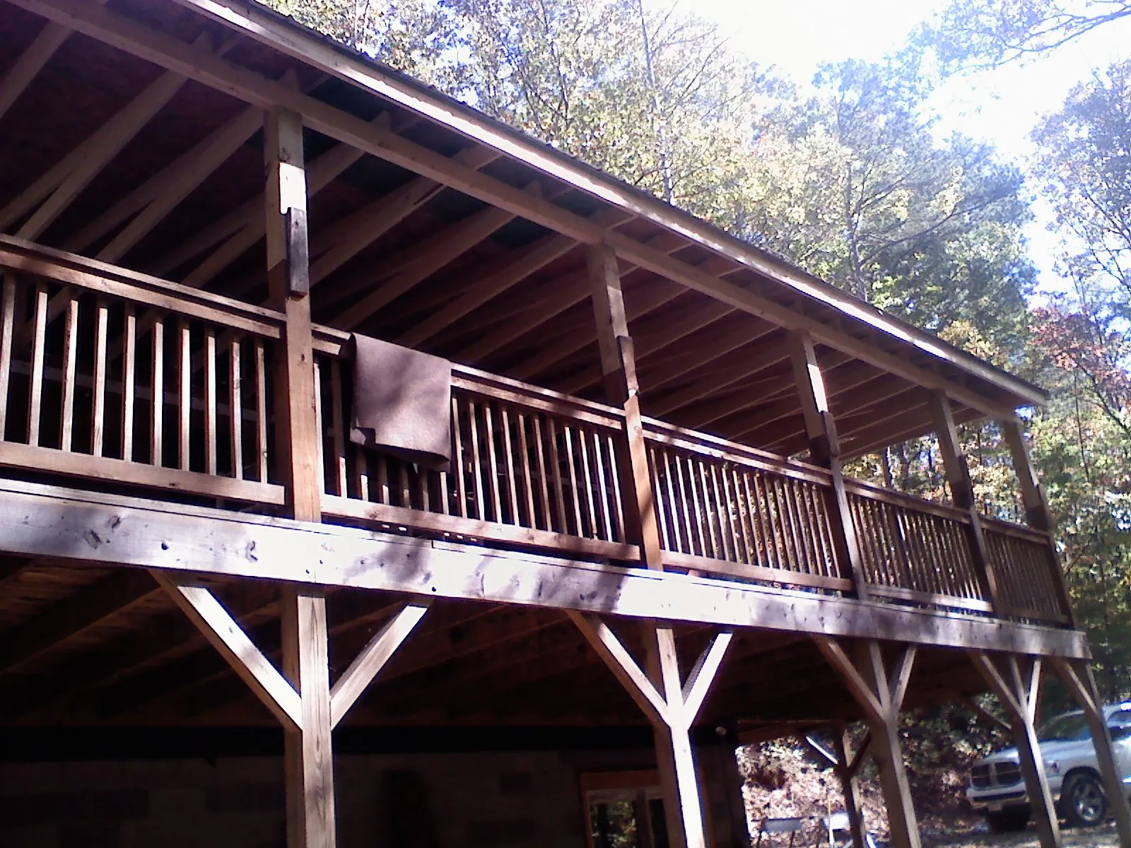 Timber framing under a new elevated porch and deck — Roof Leak Repair in North Reading by Roofing Brothers